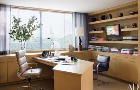 Home office with desk, chairs, cupboards and display shelf