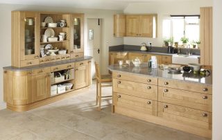 Kitchen with wooden cupboards and drawers